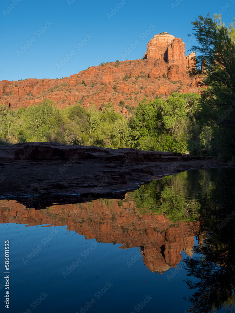 Cathedral Rock reflected in water at sunset, view from Crescent Moon Ranch picnic site - Sedona, USA
