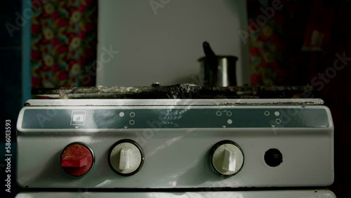 Vintage kitchen stove front view, dark kitchen ambience