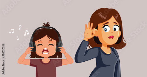 Curious Parent Trying to Overhear Offensive Music from Child Headphones. Mom overhearing indecent rude lyrics from a song her daughter listens 
 photo