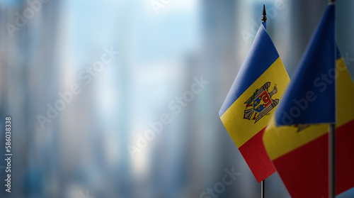 A small Moldavia flag on an abstract blurry background