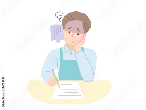 頬杖を付きながら書類を書くエプロン姿の男性