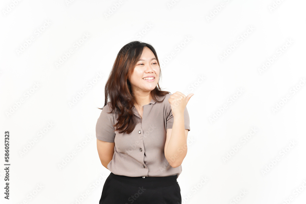 Presenting and Pointing Side Product Using Thumb Of Beautiful Asian Woman Isolated On White Presenting and Pointing Side Product Using Thumb Of Beautiful Asian Woman Isolated On White