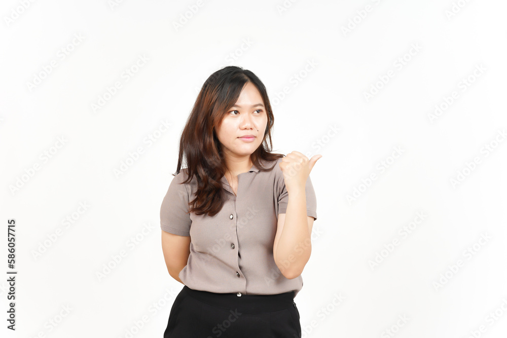 Presenting and Pointing Side Product Using Thumb Of Beautiful Asian Woman Isolated On White Presenting and Pointing Side Product Using Thumb Of Beautiful Asian Woman Isolated On White