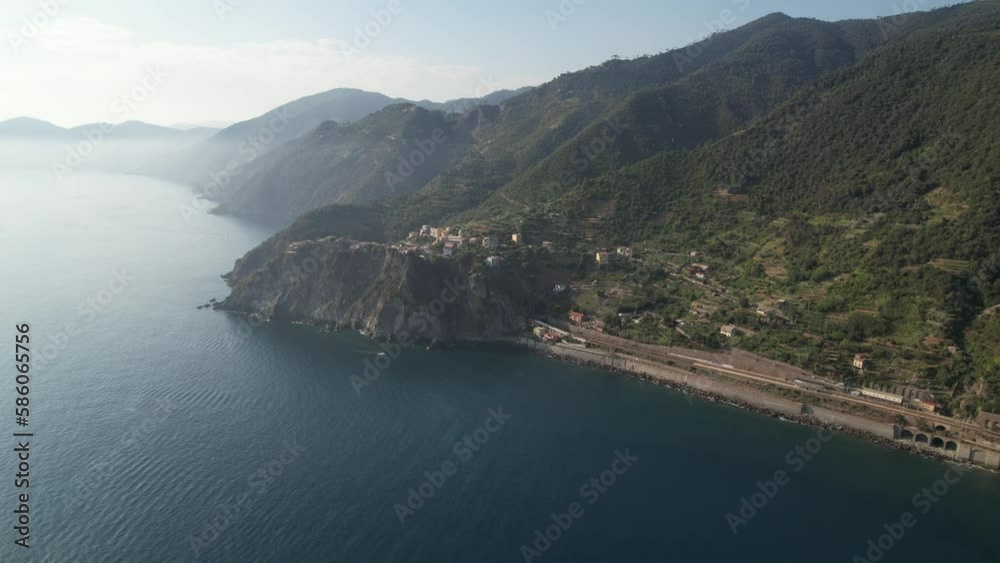Aerial video over the coast of Italy on a sunny day with the small town of La Spezia Aerial video over the coast of Italy on a sunny day with the small town of La Spezia