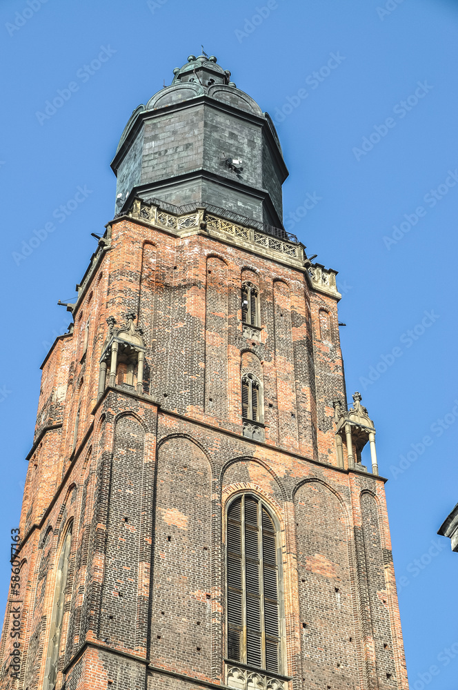 tower of the town hall building with a clock tower in the Old Town Square in Wrocław