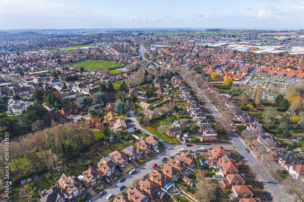 scenic drone shot of Wollaton district on a beautiful day, suburb in Nottingham, UK. High quality photo