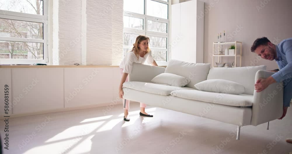 Person Lifting Heavy Furniture Couch Having Back Person Lifting Heavy Furniture Couch Having Back