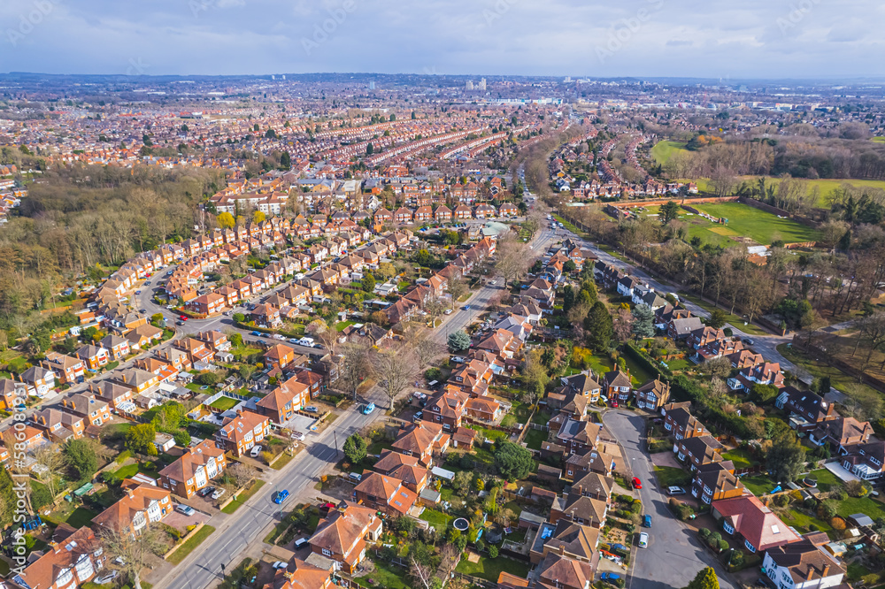 drone shot of Wollaton district, small and pretty orange houses in a row, sunny day, Nottingham, UK. High quality photo