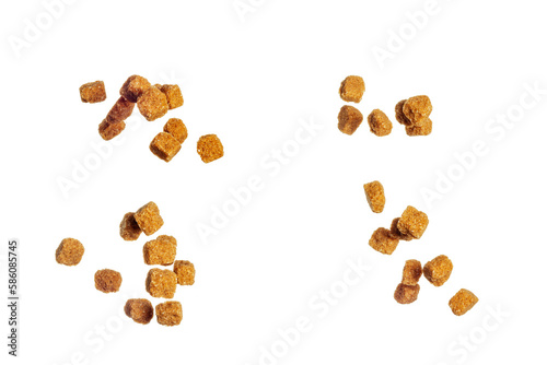 Falling Brown cane sugar cubes isolated on white background, full depth of field