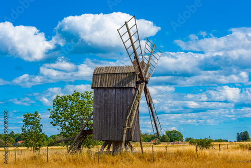 Old wooden windmill at Öland island in Sweden photo