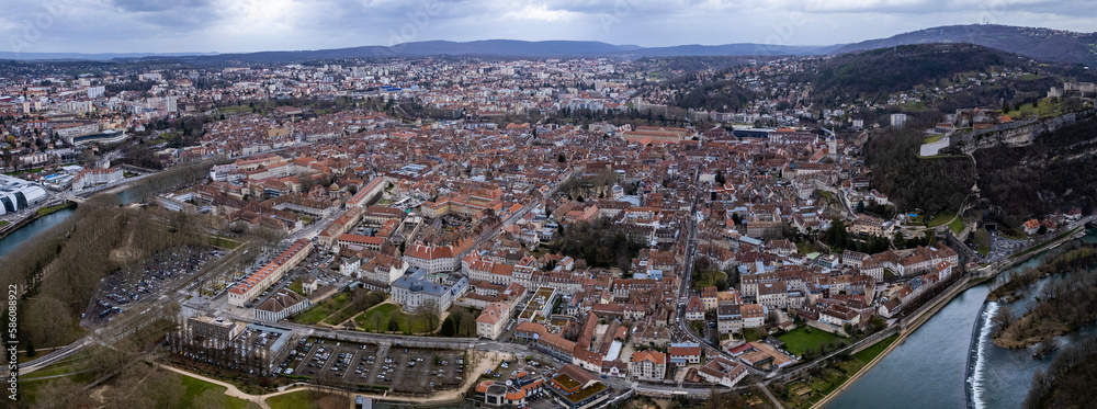Aerial of the city besancon in France on cloudy afternoon in late winter.