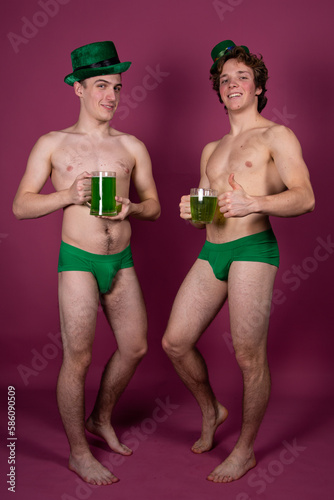 Two young attractive guys. St.Patrick 's Day.