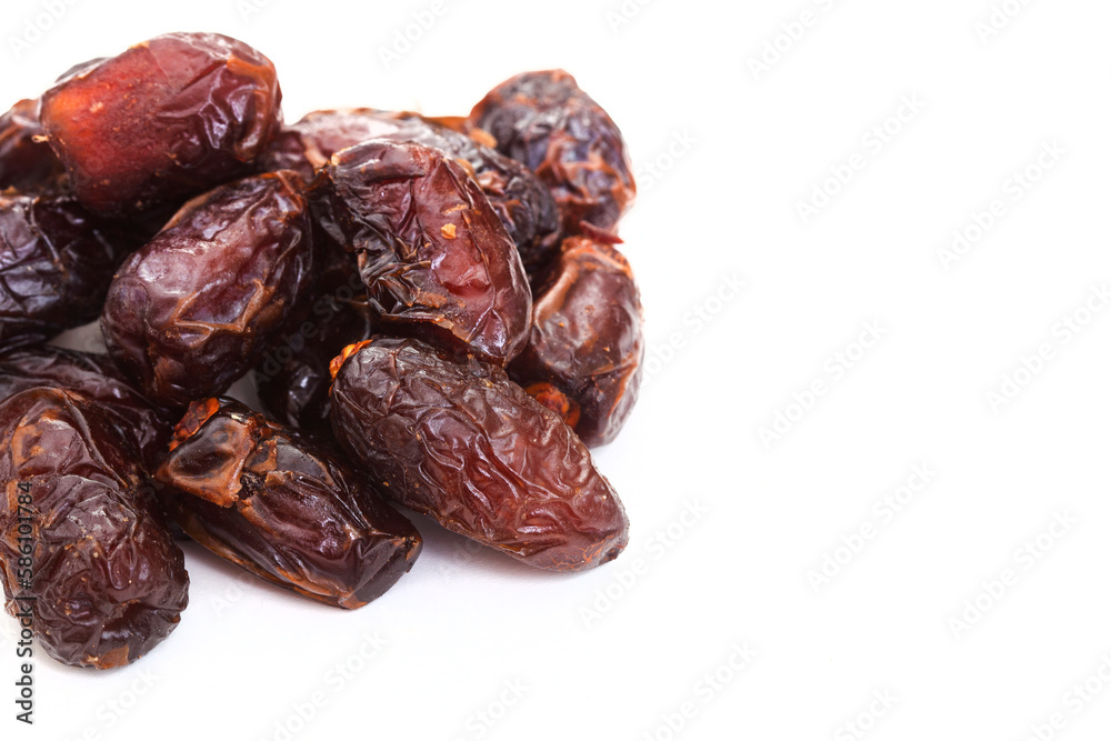 Delicious, dried dates isolated on white background Delicious, dried dates isolated on white background