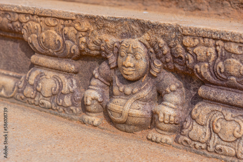 Ancient carving at Anuradhapura cultural sight in Sri lanka photo