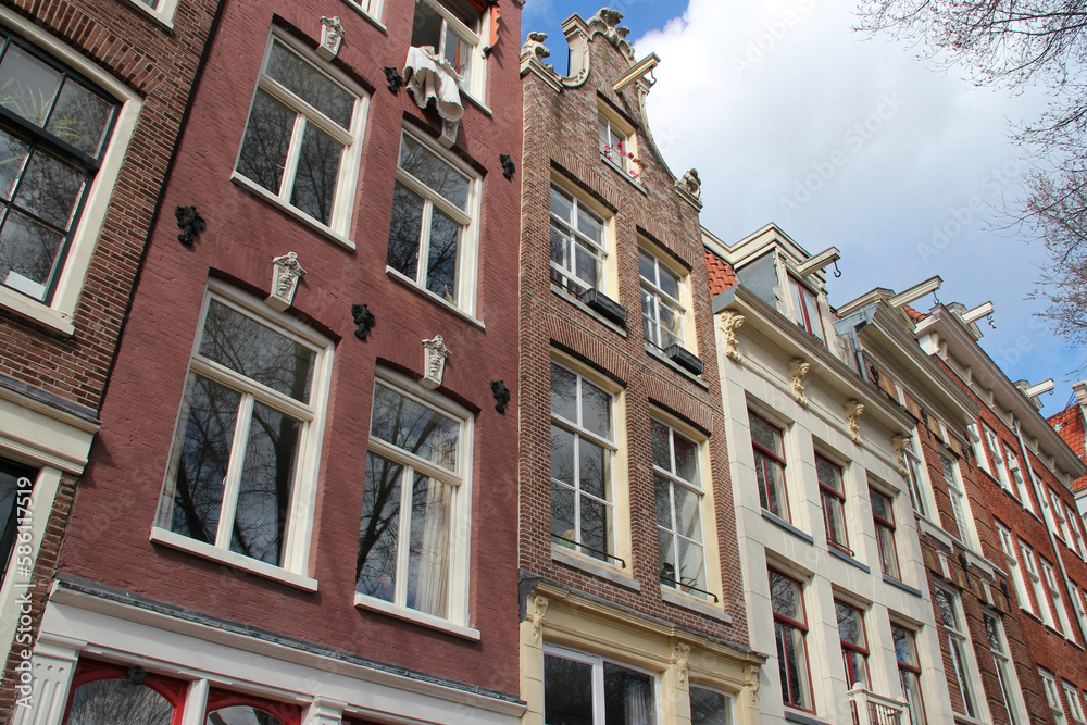 old houses at geldersekade in amsterdam in netherlands