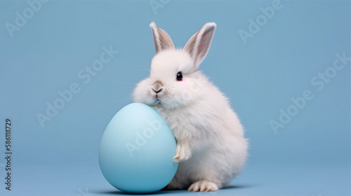 Cute bunny and single easter egg. Concept of happy easter day. photo