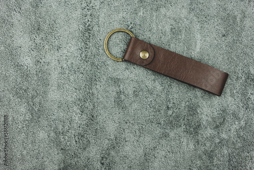 Empty of a brown keychain in imitation leather ready for you put mark and logo