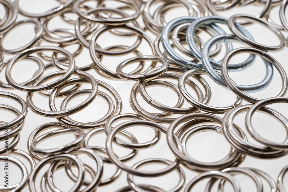 Many metal rings on a light background Many metal rings on a light background