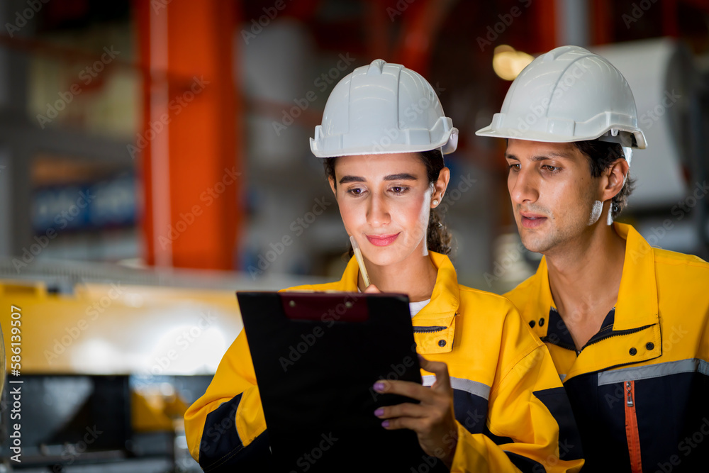 A new generation of engineers in a metal sheet factory. Studying work methods from supervisors or colleagues and studying by yourself be taught professionally A new generation of engineers in a metal sheet factory. Studying work methods from supervisors or colleagues and studying by yourself be taught professionally