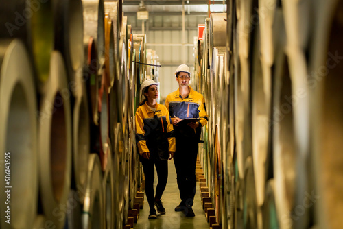 A new generation of engineers in a metal sheet factory. Studying work methods from supervisors or colleagues and studying by yourself be taught professionally