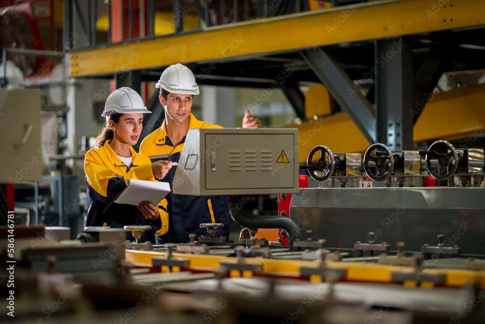 A new generation of engineers in a metal sheet factory. Studying work methods from supervisors or colleagues and studying by yourself be taught professionally A new generation of engineers in a metal sheet factory. Studying work methods from supervisors or colleagues and studying by yourself be taught professionally