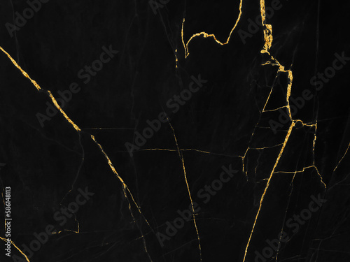 Black and gold marble luxury wall texture with shiny golden line pattern abstract background design for a cover book or wallpaper and banner website.	
