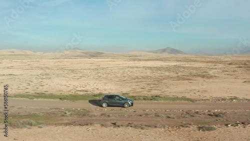 Car driving in Fuerteventure island desert photo