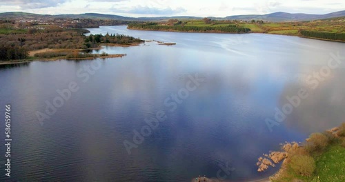 Beautiful colours in the Wicklow Mountains  Ireland  Blessington Lakes drone sweep shot  as golden hour  spreads it's magic photo