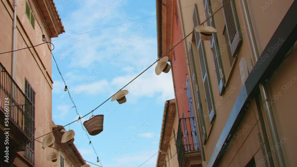Abandoned alley in Mallorca with a blue sky backdrop. Straw hats sway in the wind on ropes across the street. Shot in slow-motion. Calming video. Perfect for relaxation or as a background.
Clip 008 Abandoned alley in Mallorca with a blue sky backdrop. Straw hats sway in the wind on ropes across the street. Shot in slow-motion. Calming video. Perfect for relaxation or as a background.
Clip 008