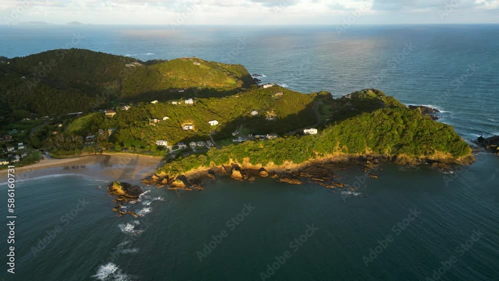Scenic aerial view of Wellingtons bay new Zealand drone fly above stunning seascape during warm golden hous Scenic aerial view of Wellingtons bay new Zealand drone fly above stunning seascape during warm golden hous