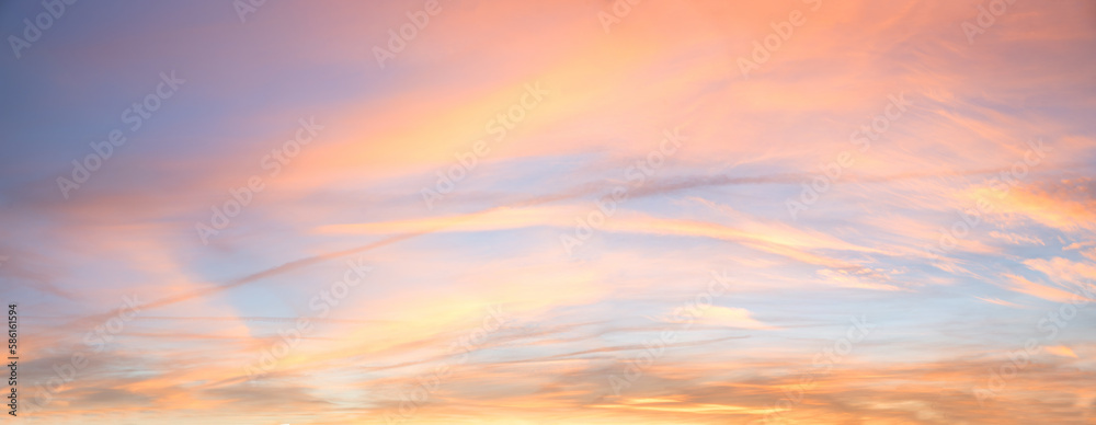 dreamy sunset sky panorama, with pastel colors clouds