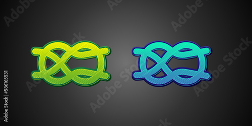 Green and blue Nautical rope knots icon isolated on black background. Rope tied in a knot. Vector