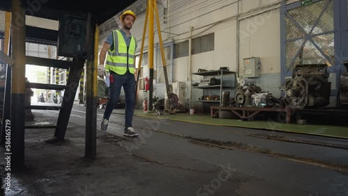 Wallpaper Mural the technician working in the train garage Torontodigital.ca
