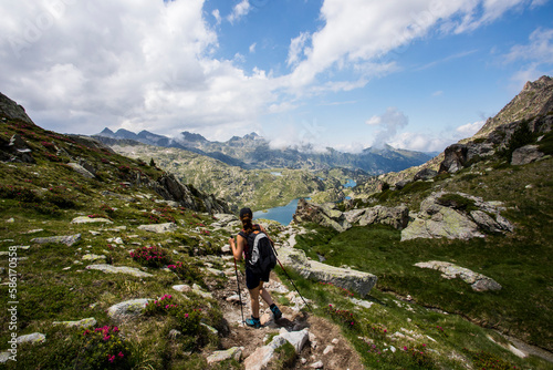 Young hiker girl summit to Ratera Peak in Aiguestortes and Sant Maurici National Park, Spain © Alberto Gonzalez 