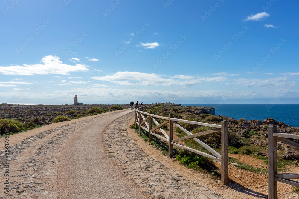 Wooden bridge to sightseeing place on Algarve coast outside Lagos, Portugal. Portuguese beaches and shores of the city of Lagos. 
