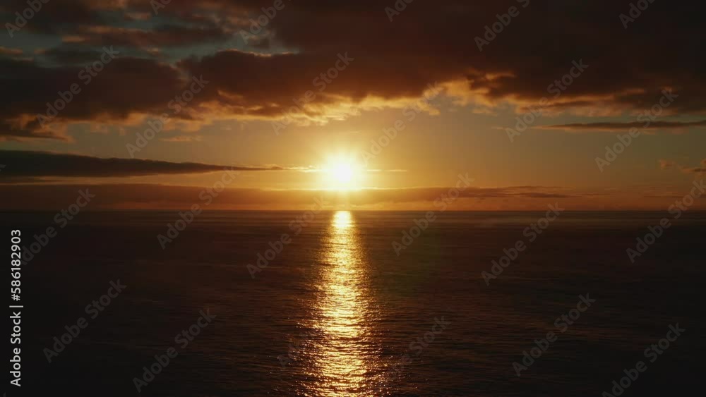 Sunset in the ocean in Pico island Azores Sunset in the ocean in Pico island Azores