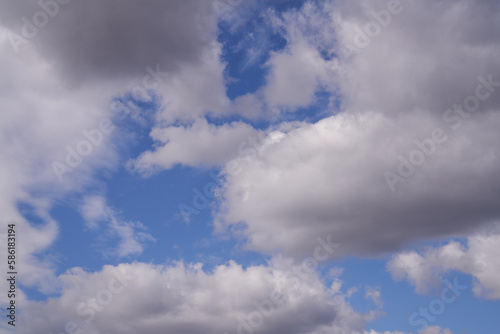 blue sky with dark clouds