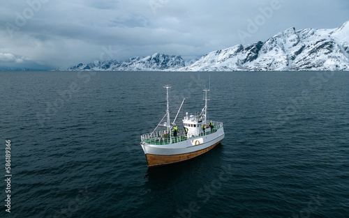 Cod fishing boat on its way to harbor. Lofoten Islands, Norway