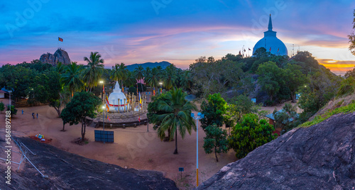 Sunset view of Maha stupa at Mihintale buddhist site in Sri Lanka photo