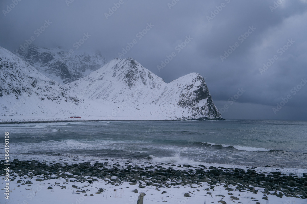 Panoramic view on Unstad beach - the iconic spot in Arctic for winter surfing on waves of Norwegian sea and Atlantic ocean, located on Lofoten islands in Norway, Scandinavia, Europe.