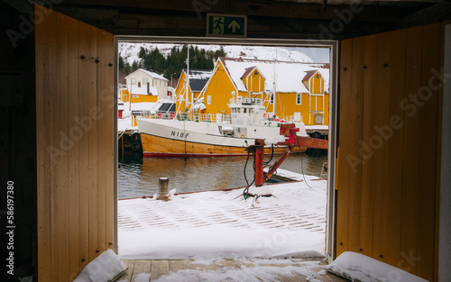 Winter view of Nusfjord town, Norway, Europe. Bright morning scene of Lofoten Islands. Norwegian seascape.  photo