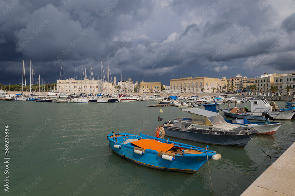 TRANI, ITALY, JULY, 8, 2022 - View of the port of Andria, Apulia, Italy in a cloudy day.