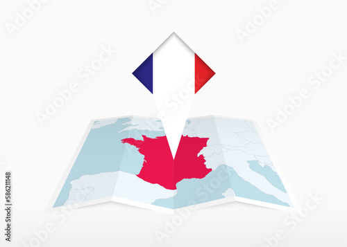 France is depicted on a folded paper map and pinned location marker with flag of France.