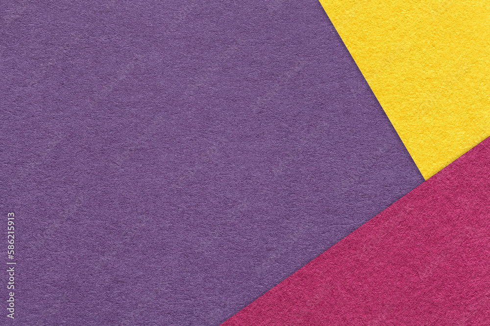 Texture of craft violet color paper background with purple and yellow border. Vintage abstract lavender cardboard. Texture of craft violet color paper background with purple and yellow border. Vintage abstract lavender cardboard.