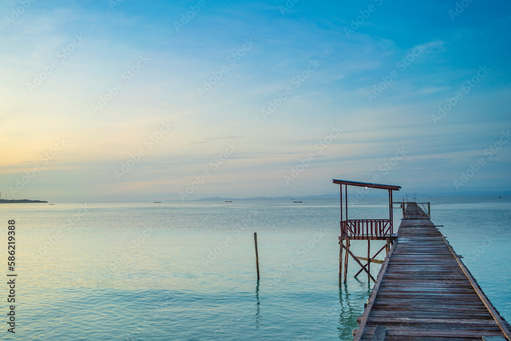Pier in morning time at the coastline of the village of Saporkren Waisai, Raja Ampat Pier in morning time at the coastline of the village of Saporkren Waisai, Raja Ampat