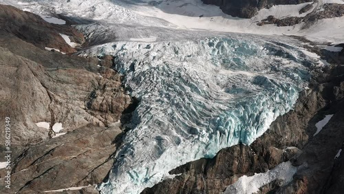 Trift glacier melting in the Swiss alps photo