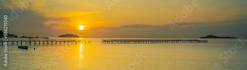 Sunrise with a broken pier at the coastline in Raja Ampat © ggfoto