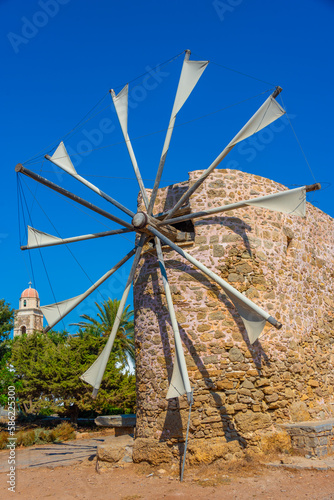 Windmill at Moni Toplou monastery at Crete island in Greece photo