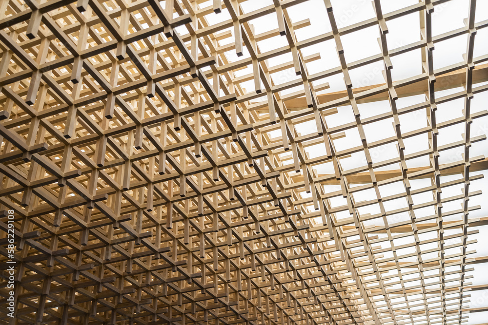 Close-up view of the wooden roof frame for building construction.