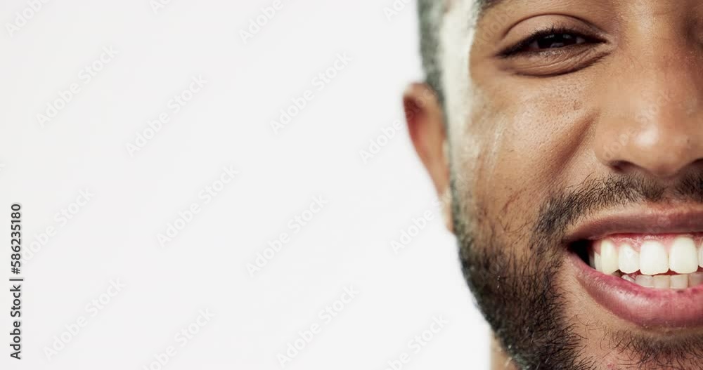 Face, closeup and man in studio for skincare, happy and laughing against white background. Zoom, smile and portrait of Indian male model excited for wellness, beauty and cosmetic care while isolated Face, closeup and man in studio for skincare, happy and laughing against white background. Zoom, smile and portrait of Indian male model excited for wellness, beauty and cosmetic care while isolated